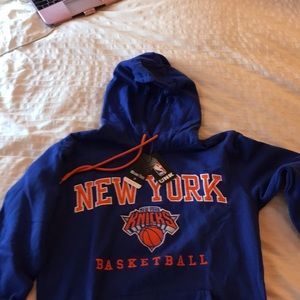 Never worn, out grown.